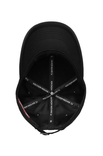 Bottom view of the Bayern Munich Hit Adjustable hat with mid constructured crown, curved peak brim, and slider buckle closure, in Black.