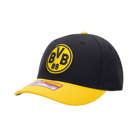 Side view of the Borussia Dortmund Core Adjustable hat with mid constructured crown, cruved peak brim, and slider buckle closure, in Black/Yellow.