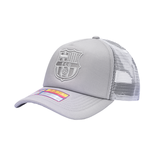 Side view of the FC Barcelona Fog Trucker Hat in Grey/White, with high crown, curved peak, mesh back and snapback closure.