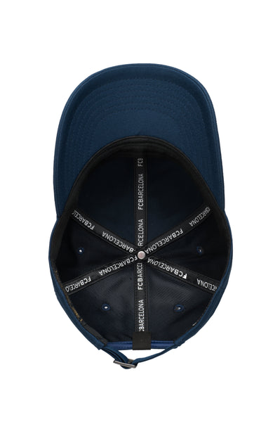 Bottom view of the FC Barcelona Hit Adjustable hat with mid constructured crown, curved peak brim, and slider buckle closure, in Navy.
