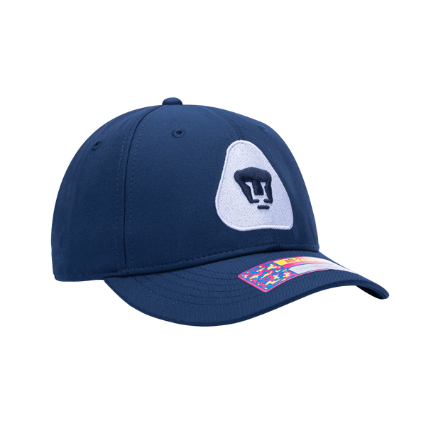 Side view of the Pumas Hit Adjustable hat with mid constructured crown, curved peak brim, and slider buckle closure, in Navy.